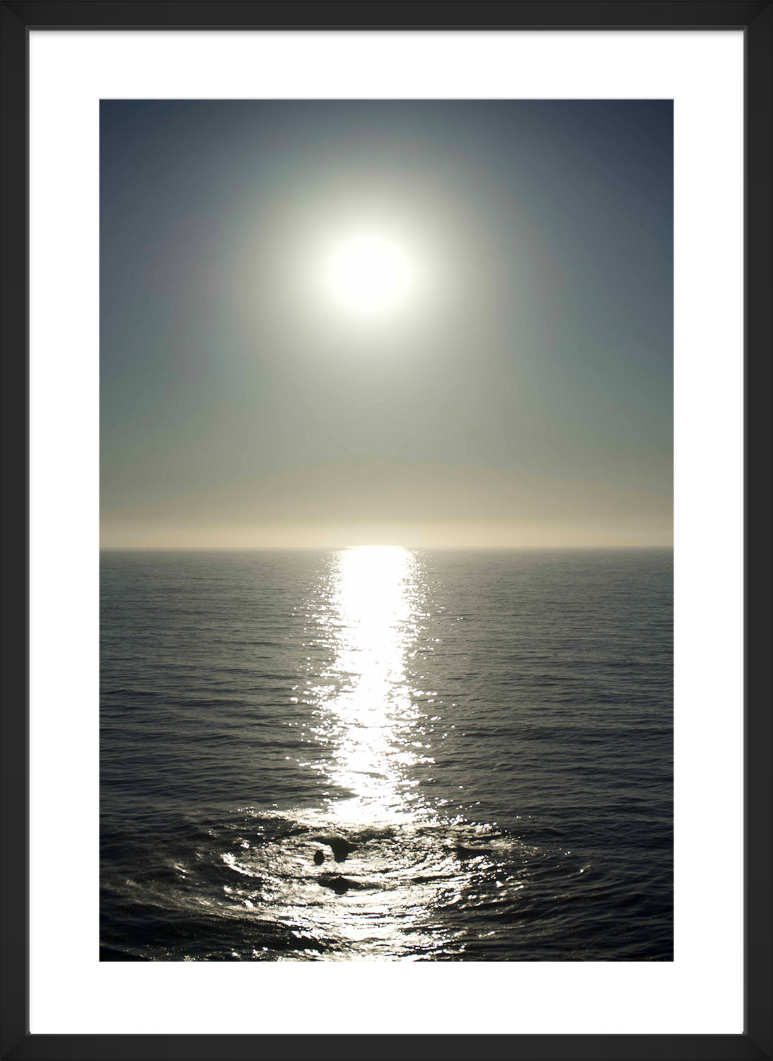 sun above ocean print black frame